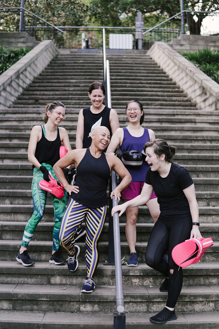 Group of active women on stairs